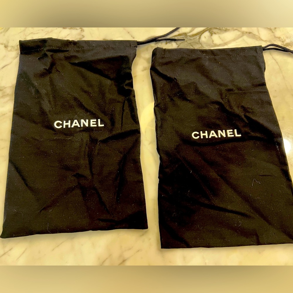 Pair of authentic 8"x12" CHANEL shoe bags.  Never used.  Tie at the top.
